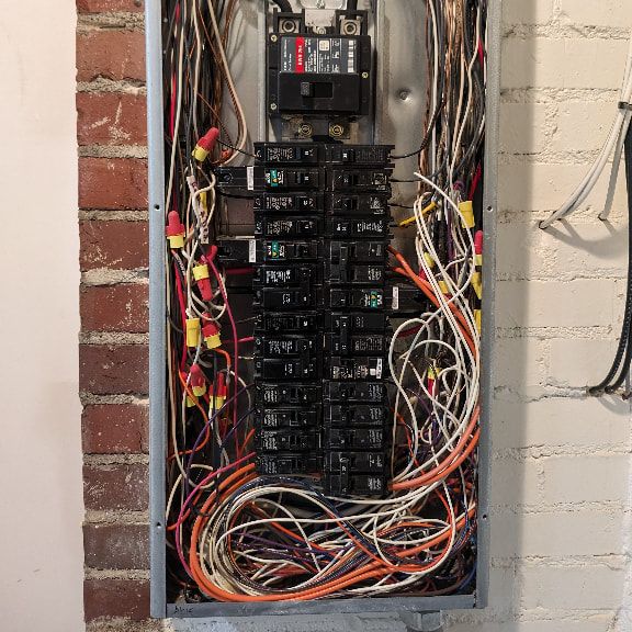 Poor Electrical Panel Workmanship With Excessive Conductor Fill