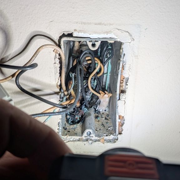 24-hour emergency electrician burned outlet wiring partial power outage