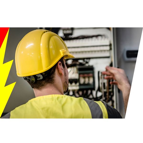 Electrician repairing an electrical panel wearing a hardhat