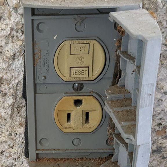 Outdated dead-front GFCI receptacle