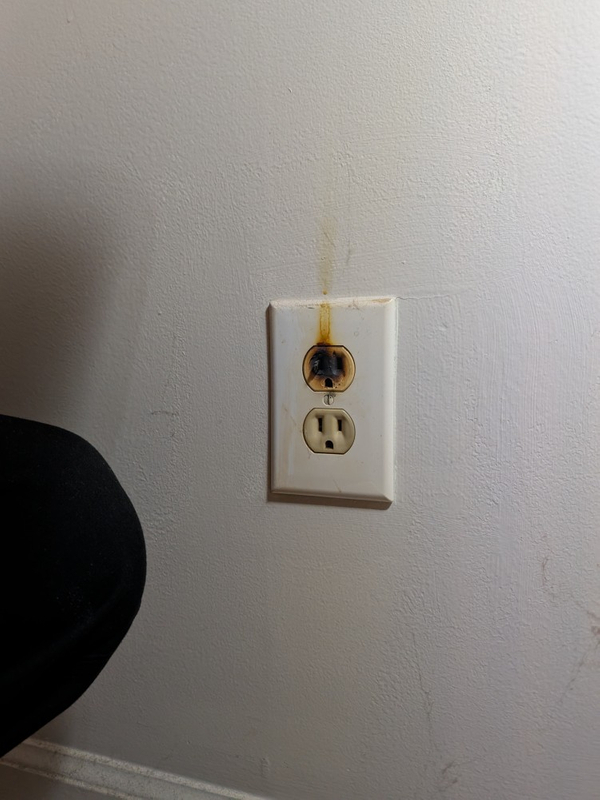 Burnt receptacle face on wall Greensboro, NC