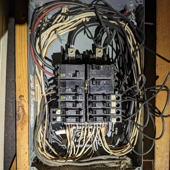 Overfilled Subpanel with Poor Workmanship