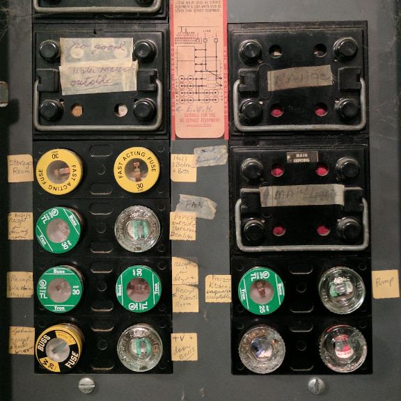 Residential fuse box showing dangerous overfusing condition