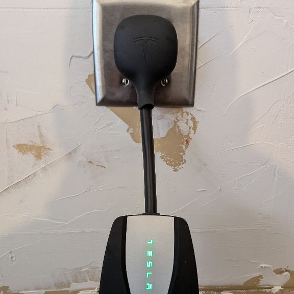 Tesla 240V Level 2 EV charging outlet indoor installation