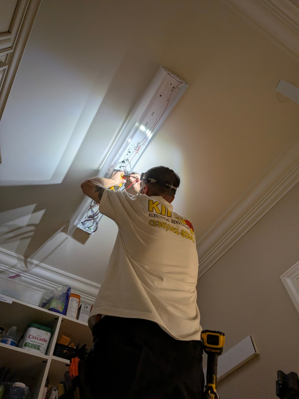 Electrician Testing Light Fixture Greensboro