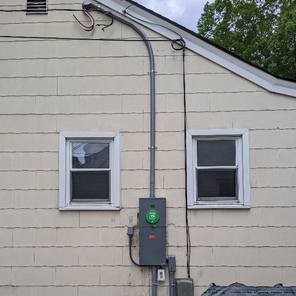 200 Amp Meter Panel Upgrade With PVC Conduit Riser
