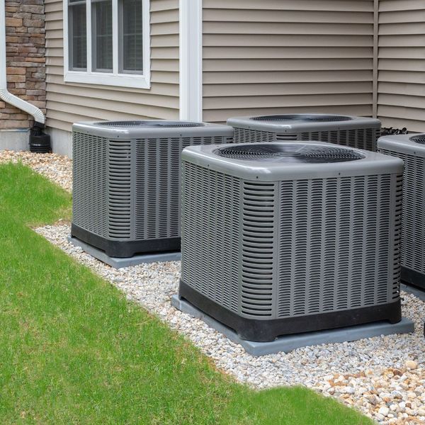 HVAC units outside a house How to Choose the Right HVAC System for Your Home2.jpg