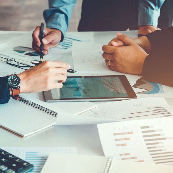 Close up view of a table during a business meeting.