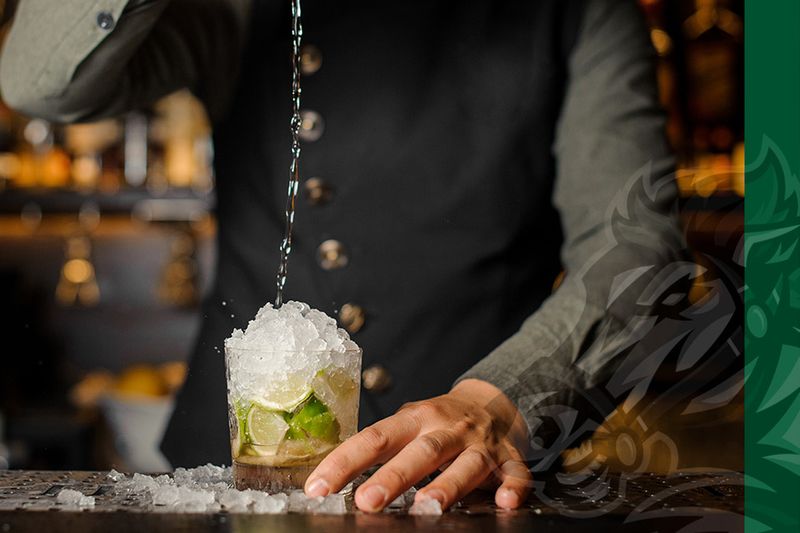 Bartender mixing a drink.