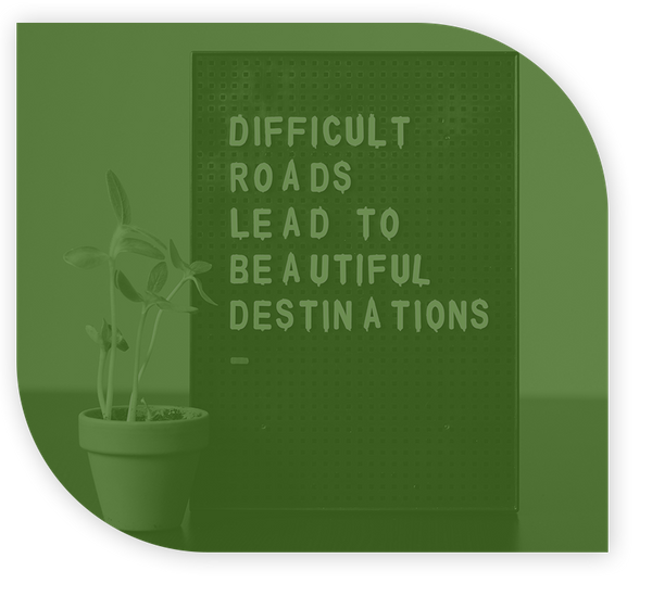 Sign saying difficult roads lead to beautiful destinations