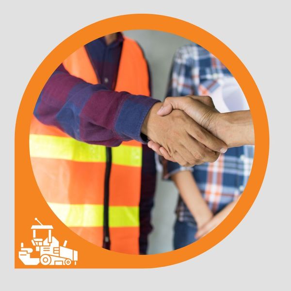 A contractor shaking hands with a customer