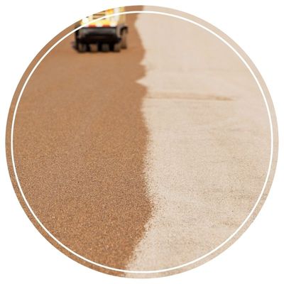 Applying a fresh layer of chip seal on road