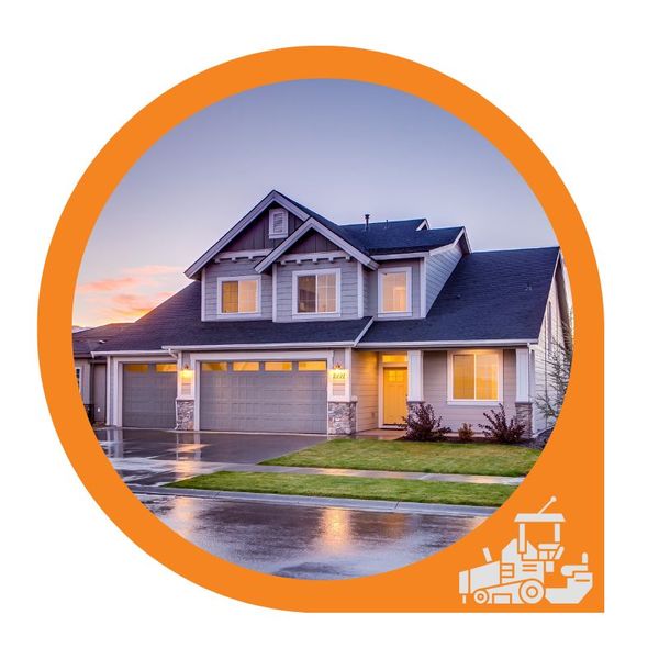 A nice suburban home with a freshly laid asphalt driveway and street