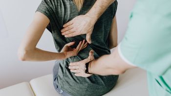 woman receiving osteopathic care