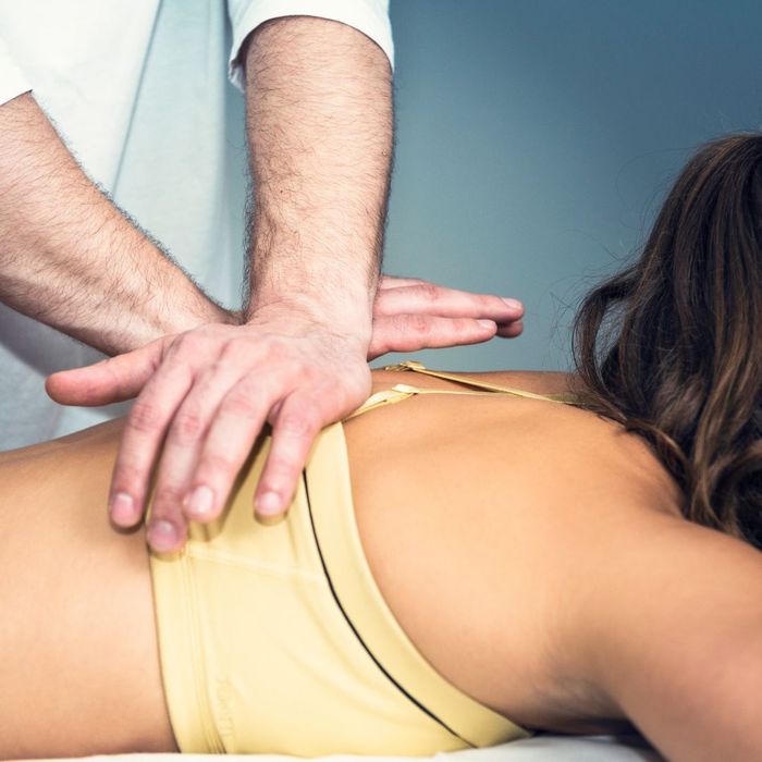 woman receiving osteopathic care