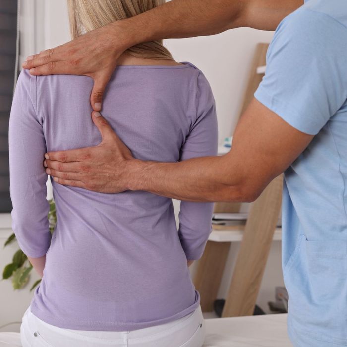 woman receiving osteopathic care