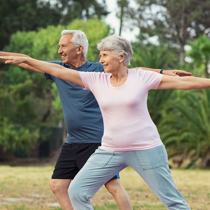 senior couple doing yoga