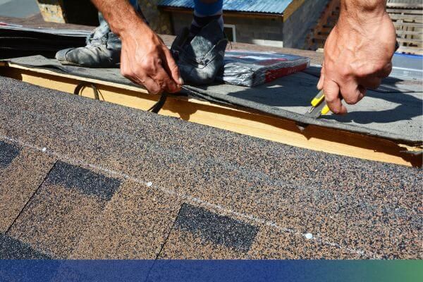 roofer working on shingles