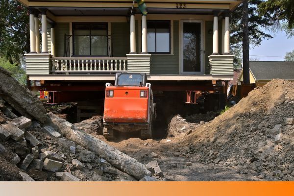 an excavator digging around a home Excavation.jpg