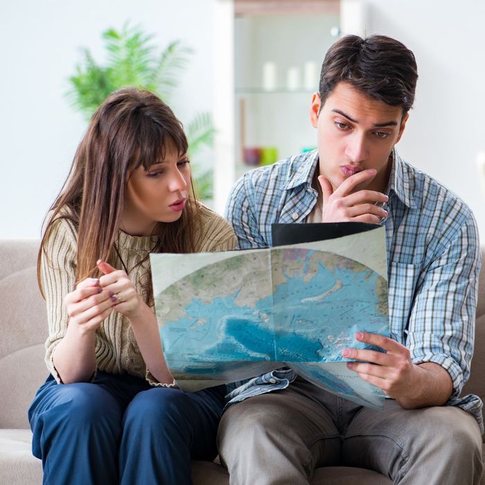 Couple looking at places to travel