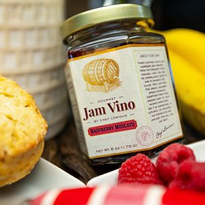 Jam vino jar with fruit and biscuits 