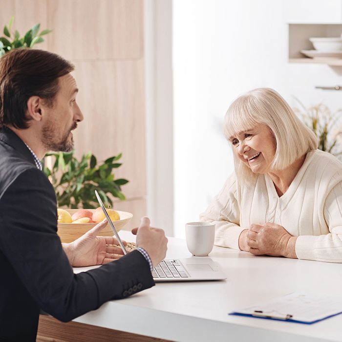 Image of a woman talking to an agent