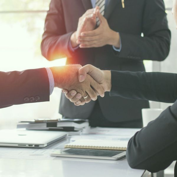 businessmen shaking hands businessmen shaking hands