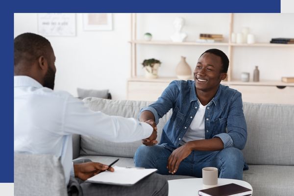Two professionals shaking hands, showing commitment to addiction therapy in San Jose.