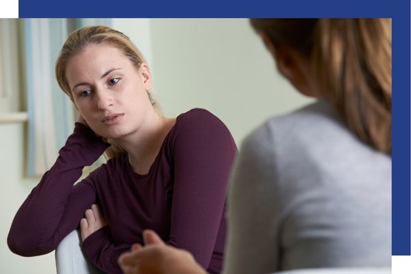 Woman receiving confidential substance abuse counseling from a therapist in San Jose.
