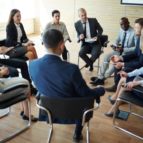 Image of people sitting in on a training