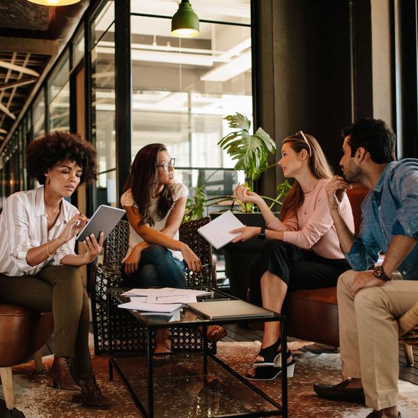 business team holding meetings on couches