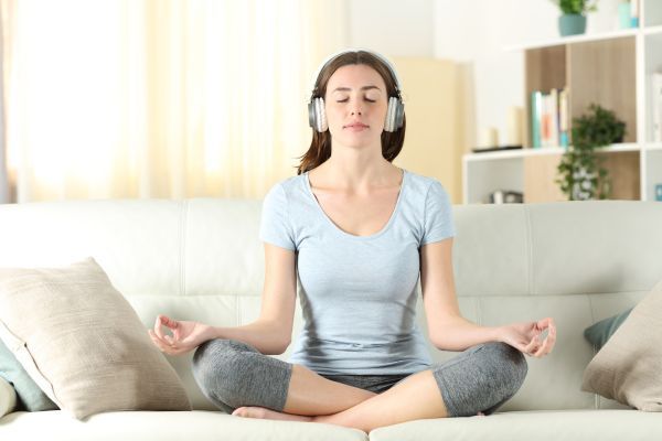 woman doing virtual guided meditation