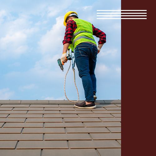 a staff standing on a roof