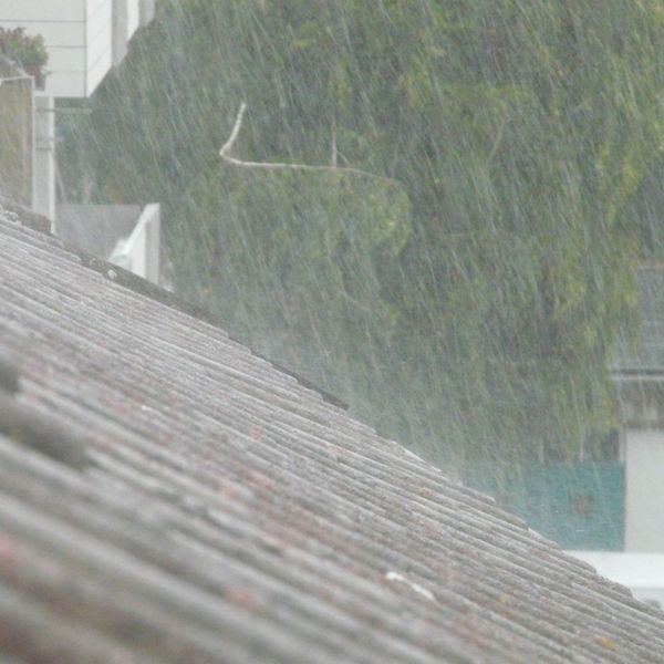 rain coming down on a roof