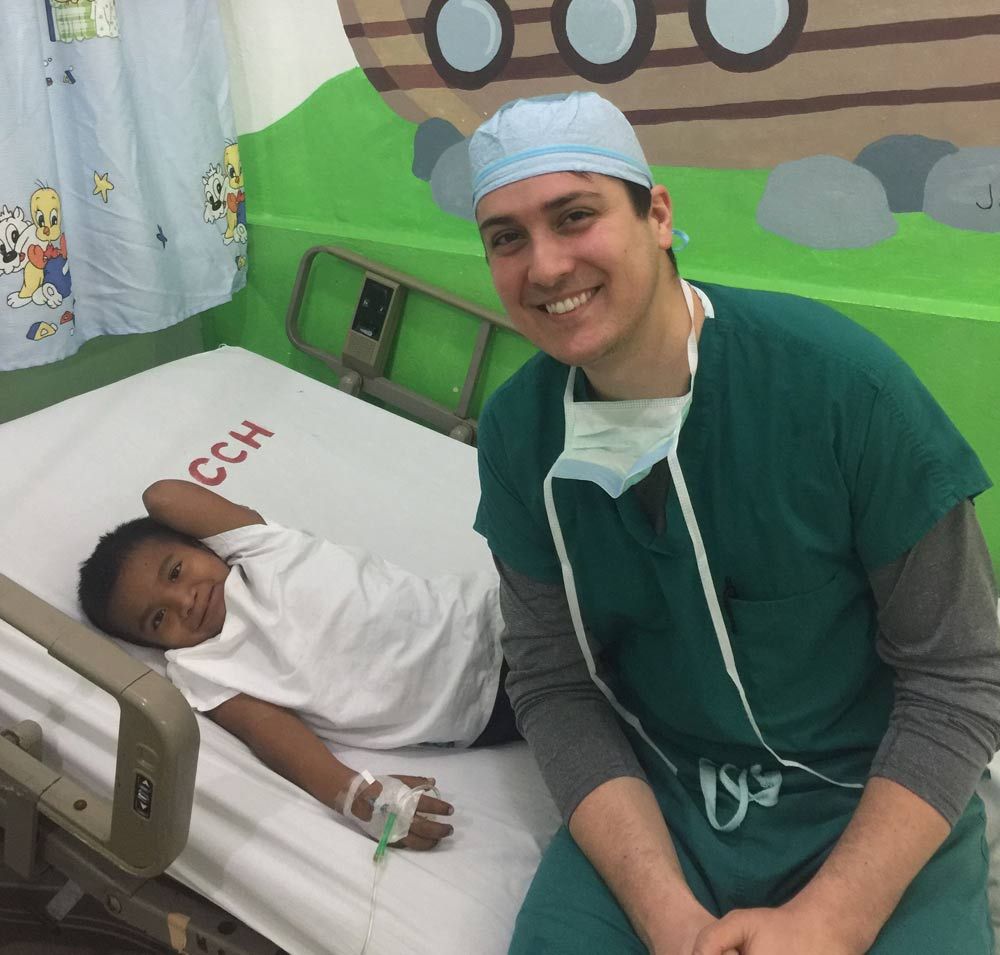 Belize Medical Mission - Dr. Harmon With Patient