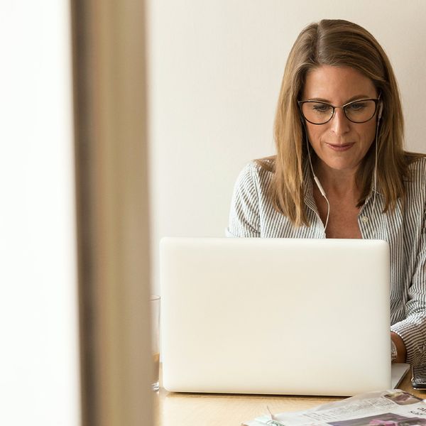 Woman doing research on her laptop.