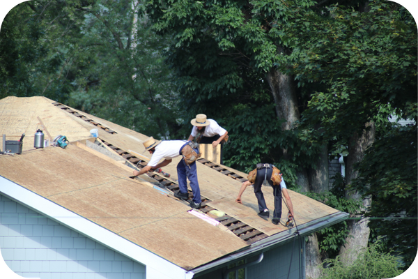 3 roofers installing a residential roof