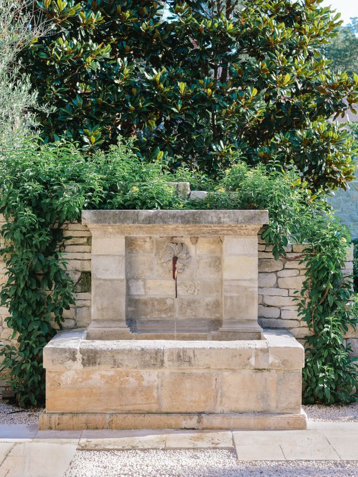Tuscan Garden Design with Limestone Fountains – Memorial Villages