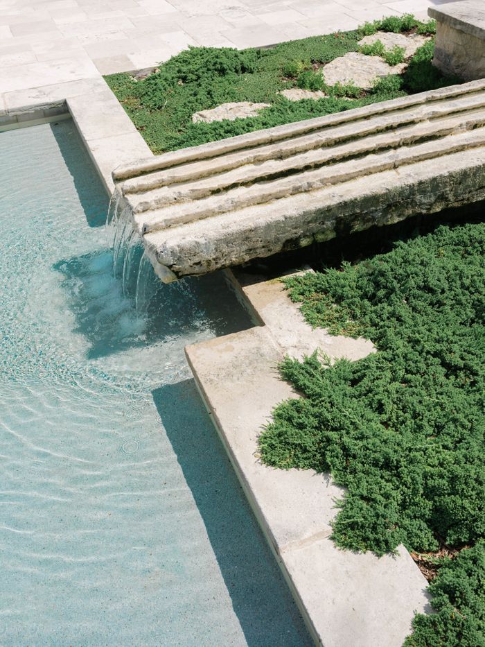 Antique French Distillery Spillway Repurposed as Spa Waterfall