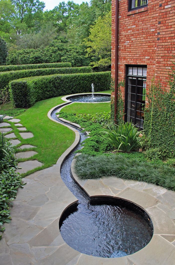 Artistic Serpentine Fountain Outside Living Room – River Oaks Estate