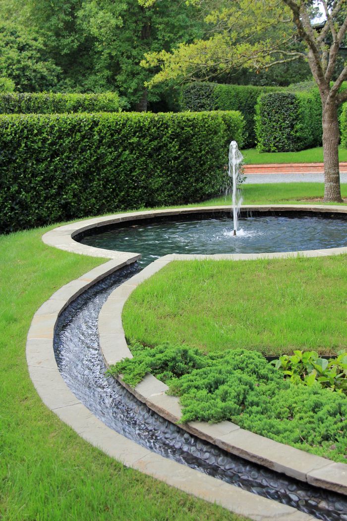 Artistic Serpentine Fountain Outside Living Room – River Oaks Estate