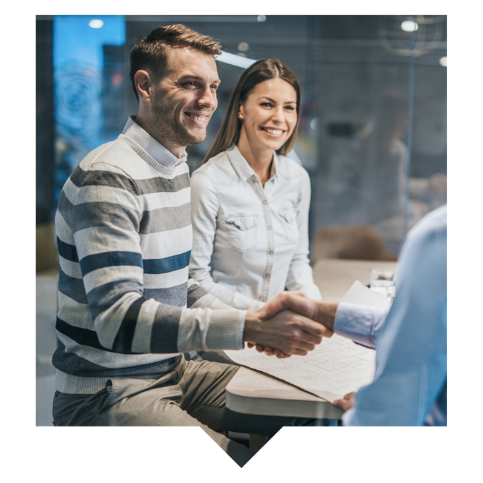 Shaking hands with a loan officer