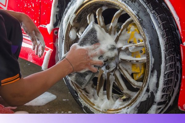 Cars wheels being cleaned 