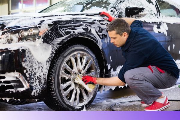Washing a cars tires 