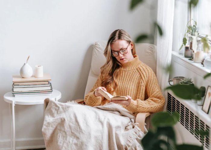 Person reading in a chair