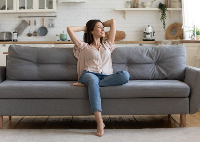 Person relaxing on a couch