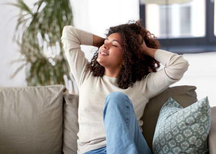 Person relaxing on a couch