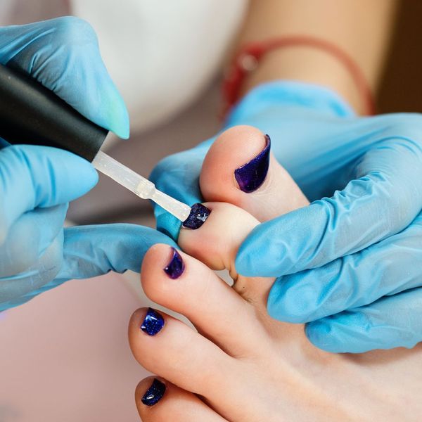 professional performing a pedicure