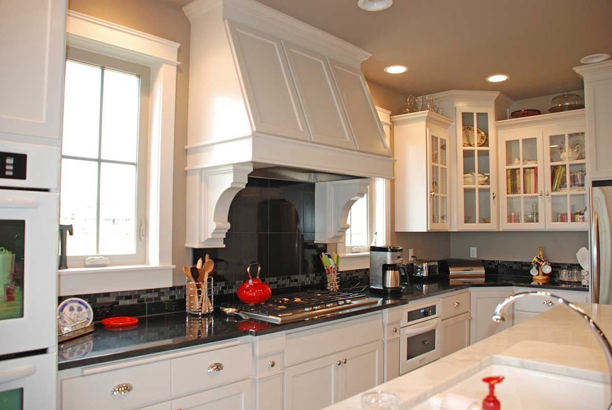 kitchen-cabinets-white-cabinets-dark-backspash.jpg