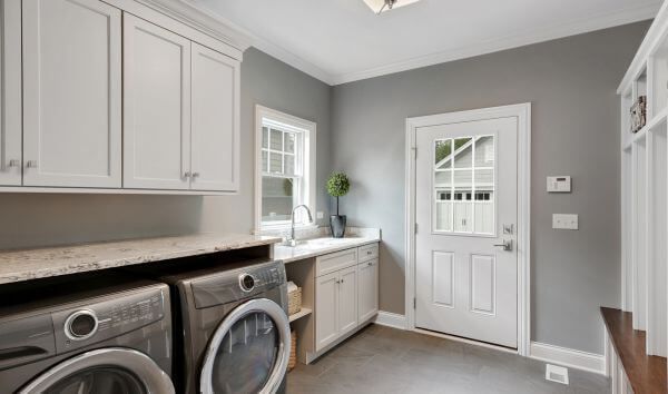 laundry room with cabinets